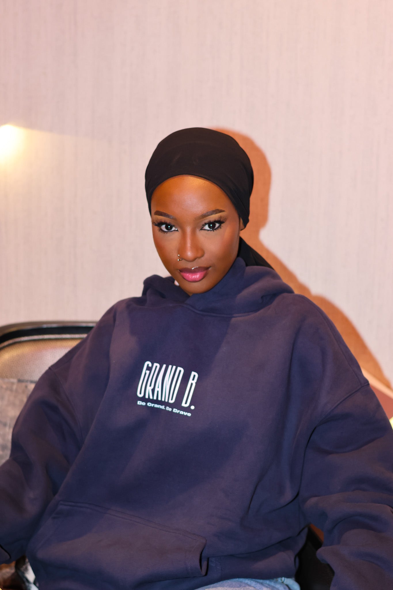 ODMPOD oversized fleeced hoodie in cozy fabric, showing a relaxed fit with a hood and long sleeves, perfect for casual wear.